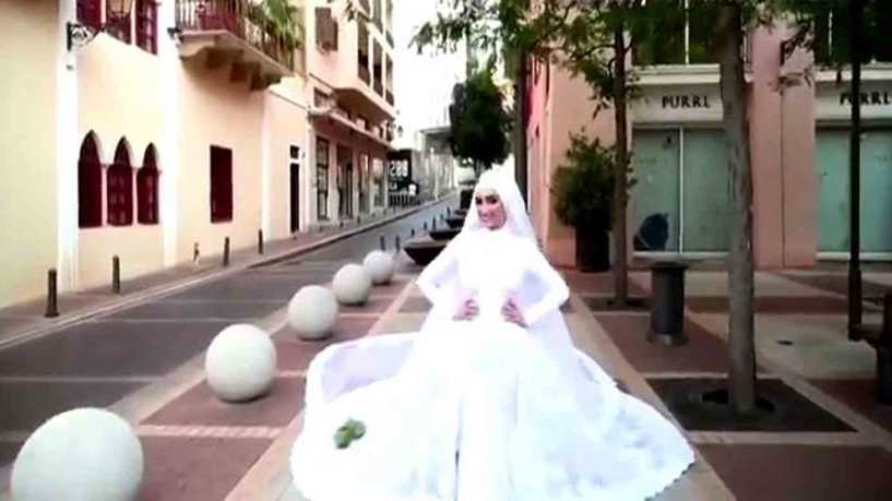فيديو|  " عروس بيروت" تتحدث عن لحظة وقوع الانفجار اثناء جلسة تصوير حفل زفافها
