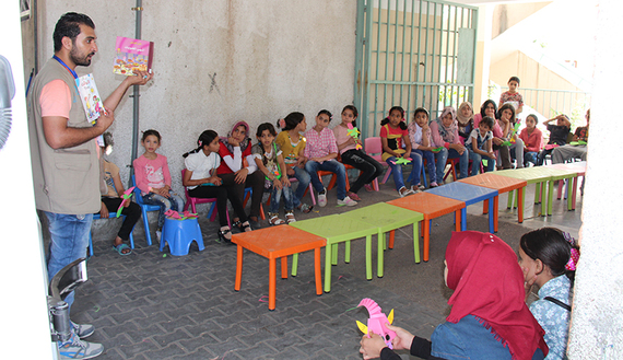 Bookmobile speed-reads through Gaza neighborhoods