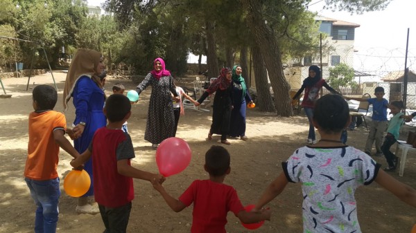 المرأة العاملة تنفذ يوم ترفيهي لأطفال ونساء قرية سوسيا 