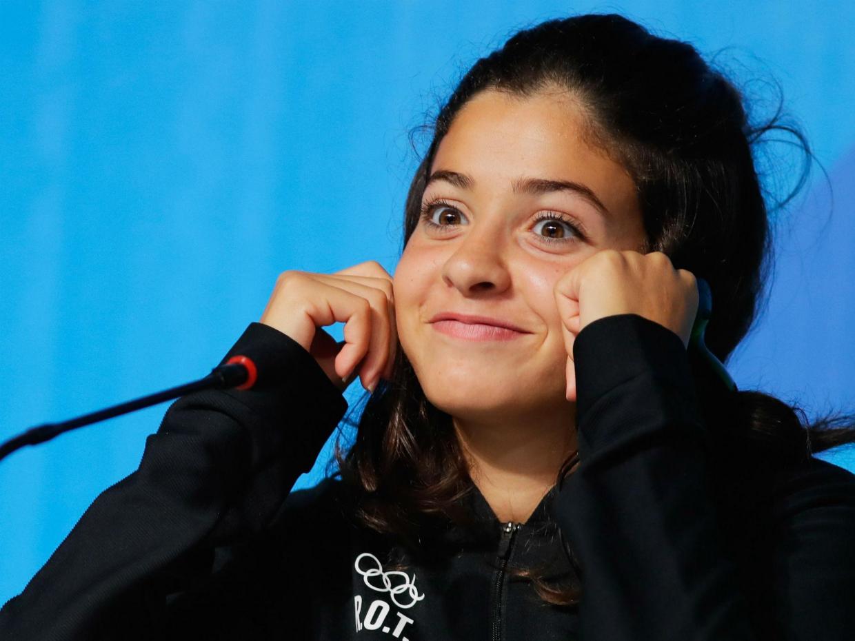 Refugee athlete Yusra Mardini becomes Olympic favourite after winning swimming heat