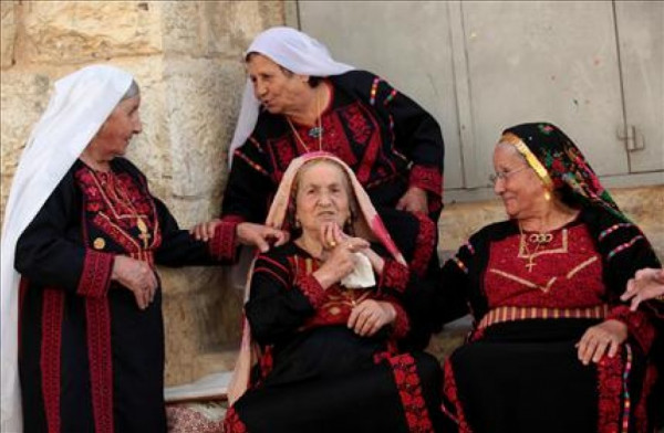 "الوطني" يهنئ المرأة الفلسطينية ونساء العالم بيوم المرأة
